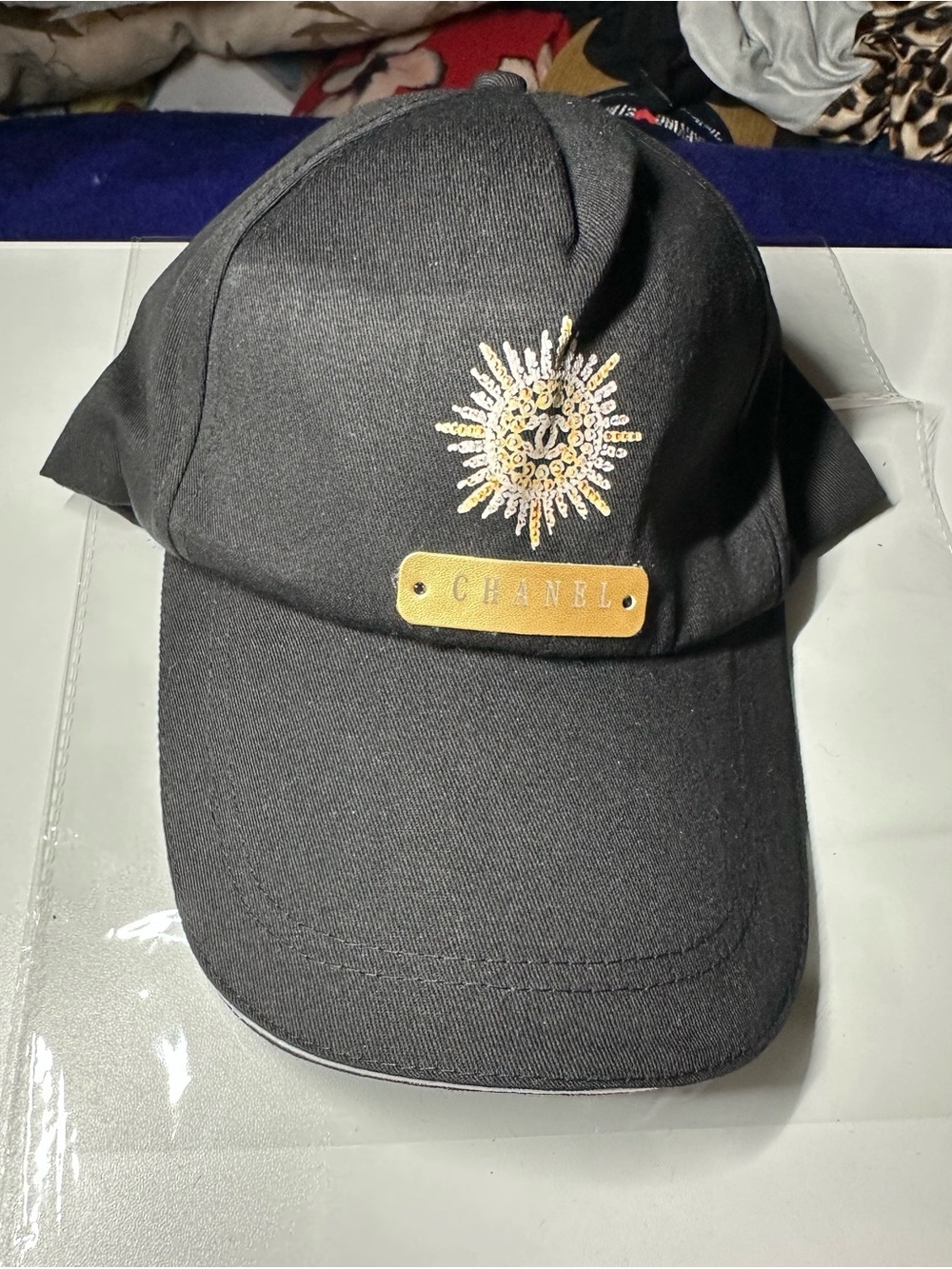 CHANEL Novelty Gift Set: Black Baseball Cap Gold Sunburst Emblem w/ Key Chain - Picture 10 of 16